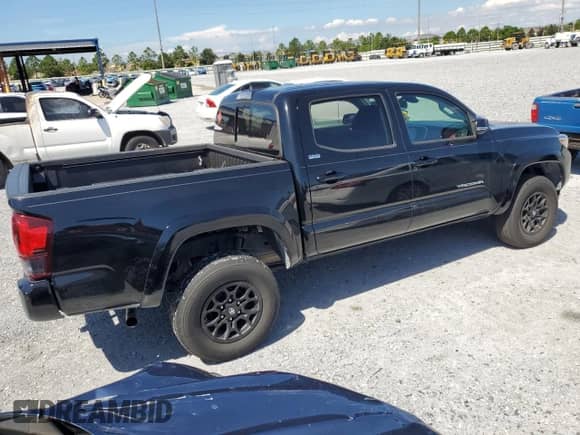 2022 Toyota Tacoma SR5 with VIN 3TMAZ5CN5NM179011, listed as a Copart auction lot 81377065 with 25,464 mi miles and Salvage title. Bid and sale history available at DreamBid. Image 3.