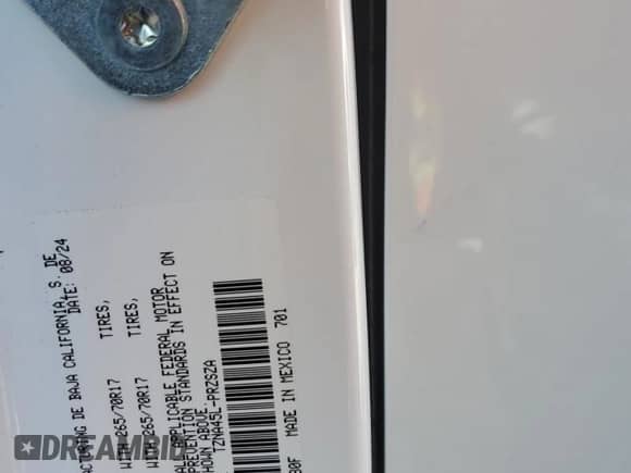 2024 Toyota Tacoma SR5 with VIN 3TMLB5JN4RM050957, listed as a Copart auction lot 71130595 with 1,873 mi miles and Salvage title. Bid and sale history available at DreamBid. Image 12.