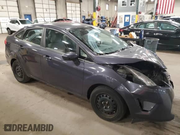 2013 Ford Fiesta S z VIN 3FADP4AJ2DM172521, wystawiony jako Copart lot #65070675 z przebiegiem 125 569 mil mil oraz Nie do naprawy • Non repairable. Historia ofert i sprzedaży dostępna na DreamBid. Obrazek 4.