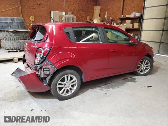 2013 Chevrolet Sonic LT with VIN 1G1JC6SG9D4159485, listed as a Copart auction lot 83822545 with 95,761 mi miles and Salvage title. Bid and sale history available at DreamBid. Image 3.