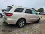2014 Dodge Durango Limited with VIN 1C4RDHDG8EC443410, listed as a Copart auction lot 61386365 with 115,570 mi miles and Salvage title. Bid and sale history available at DreamBid. Image 3.