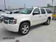 2014 Chevrolet Suburban LTZ with VIN 1GNSKKE79ER231994, listed as a Copart auction lot 71830095 with 152,865 mi miles and Clean title. Bid and sale history available at DreamBid. Image 1.