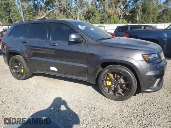 2020 Jeep Grand Cherokee Trackhawk с VIN 1C4RJFN9XLC407356, выставлен на аукционе Copart как лот 80822934 с пробегом 10 072 миль миль и На запчасти • Non repairable. История ставок и продаж доступна на DreamBid. Изображение 4.