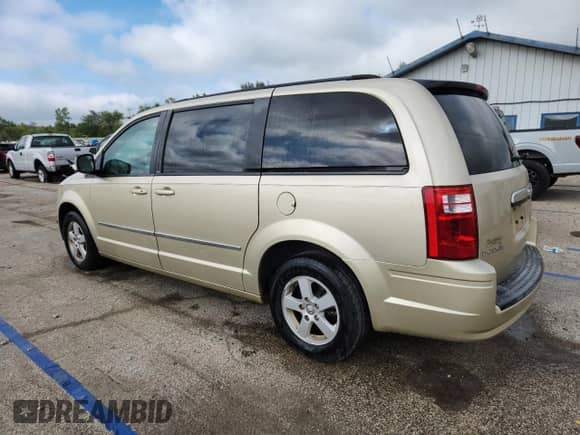 2010 Dodge Grand Caravan SXT с VIN 2D4RN5D19AR220191, выставлен на аукционе Copart как лот 69233045 с пробегом 58 716 миль миль и Списание • Salvage title. История ставок и продаж доступна на DreamBid. Изображение 2.