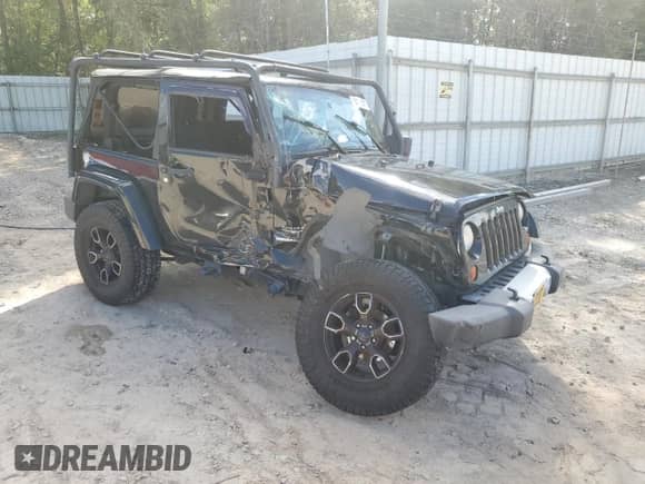 2012 Jeep Wrangler Sahara with VIN 1C4AJWBG0CL249027, listed as a Copart auction lot 84701175 with 91,717 mi miles and Salvage title. Bid and sale history available at DreamBid. Image 4.