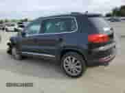 2013 Volkswagen Tiguan SE z VIN WVGAV3AX8DW059220, wystawiony jako Copart lot #49921455 z przebiegiem 138 666 mil mil oraz Szkoda całkowita • Salvage title. Historia ofert i sprzedaży dostępna na DreamBid. Obrazek 2.