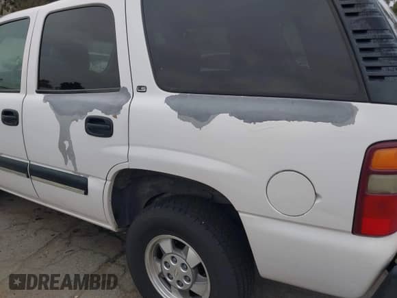 2001 Chevrolet Tahoe LT z VIN 1GNEC13T01R186863, wystawiony jako IAAI lot #42053232 z przebiegiem 345 089 mil mil oraz . Historia ofert i sprzedaży dostępna na DreamBid. Obrazek 12.