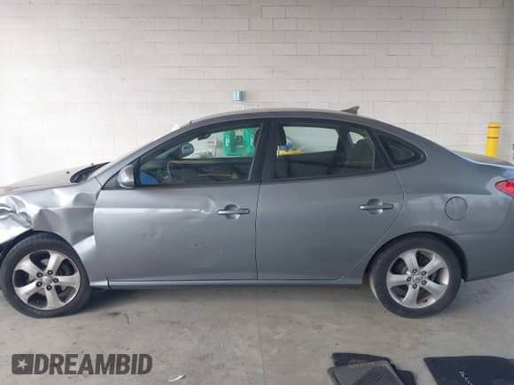 2010 Hyundai Elantra GLS z VIN KMHDU4AD1AU163017, wystawiony jako IAAI lot #43189615 z przebiegiem 177 100 mil mil oraz . Historia ofert i sprzedaży dostępna na DreamBid. Obrazek 14.