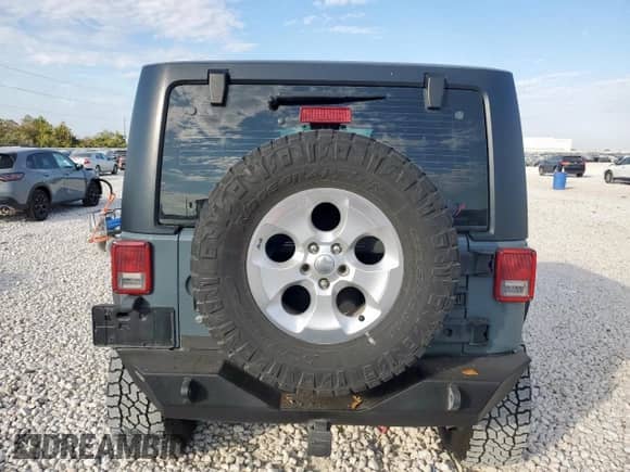 2014 Jeep Wrangler Sport with VIN 1C4AJWAG0EL308436, listed as a Copart auction lot 81949885 with 123,925 mi miles and Salvage title. Bid and sale history available at DreamBid. Image 6.