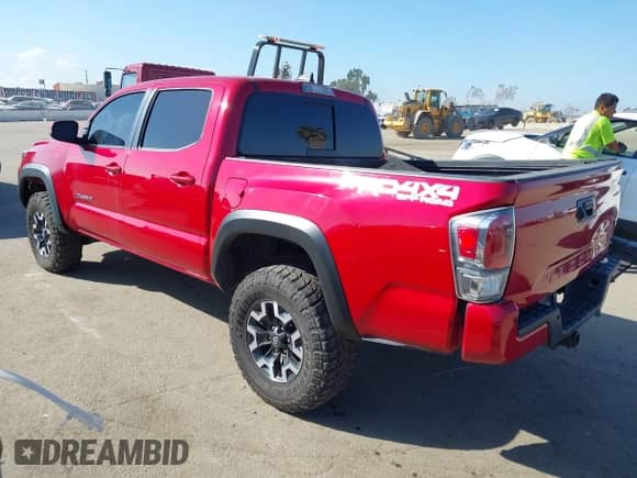 2021 Toyota Tacoma SR z VIN 5TFCZ5AN0MX262902, wystawiony jako IAAI lot #43535009 z przebiegiem 70 926 mil mil oraz . Historia ofert i sprzedaży dostępna na DreamBid. Obrazek 3.