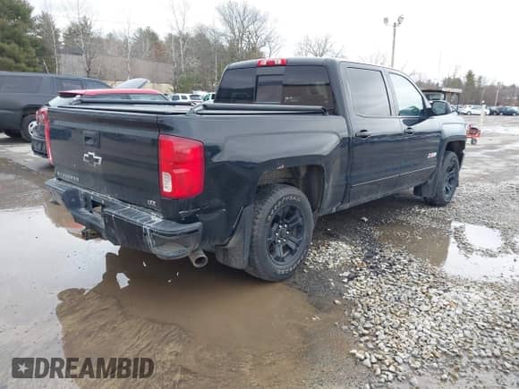 2016 Chevrolet Silverado 1500 LTZ with VIN 3GCUKSEC7GG377750, listed as a IAAI auction lot 41266073 with 184,720 mi miles and . Bid and sale history available at DreamBid. Image 4.