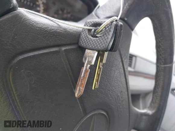 1992 Mercedes-Benz 300 z VIN WDBEB28E3NB558723, wystawiony jako IAAI lot #42354355 z przebiegiem 232 059 mil mil oraz . Historia ofert i sprzedaży dostępna na DreamBid. Obrazek 11.