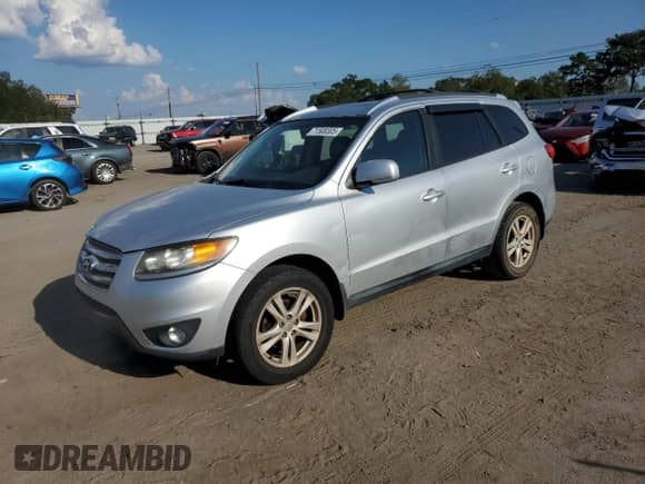 2012 Hyundai Santa Fe SE с VIN 5XYZH4AG7CG102932, выставлен на аукционе Copart как лот 71500305 с пробегом 154 758 миль миль и Списание • Salvage title. История ставок и продаж доступна на DreamBid. Изображение 1.