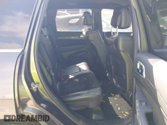 2014 Jeep Grand Cherokee SRT-8 z VIN 1C4RJFDJXEC390248, wystawiony jako IAAI lot #41794995 z przebiegiem 87 881 mil mil oraz . Historia ofert i sprzedaży dostępna na DreamBid. Obrazek 8.