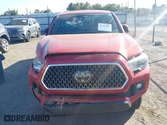 2019 Toyota Tacoma SR5 with VIN 3TMAZ5CNXKM102209, listed as a IAAI auction lot 43392417 with 94,767 mi miles and . Bid and sale history available at DreamBid. Image 12.