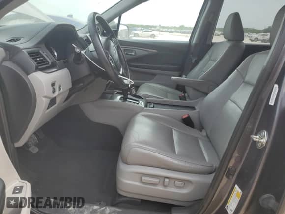 2018 Honda Pilot EX-L z VIN 5FNYF6H68JB017788, wystawiony jako Copart lot #53171515 z przebiegiem 119 277 mil mil oraz Czysty tytuł • Clean title. Historia ofert i sprzedaży dostępna na DreamBid. Obrazek 7.