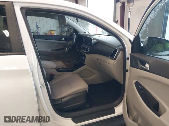 2021 Hyundai Tucson SE with VIN KM8J23A46MU365472, listed as a IAAI auction lot 43077317 with 94,891 mi miles and . Bid and sale history available at DreamBid. Image 5.