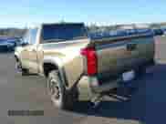 2024 Toyota Tacoma SR5 with VIN 3TMLB5JN6RM048448, listed as a IAAI auction lot 41005722 with 1,562 mi miles and . Bid and sale history available at DreamBid. Image 3.