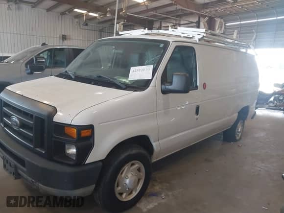 2010 Ford Econoline Cargo Commercial with VIN 1FTNE2EL7ADA74595, listed as a IAAI auction lot 42512878 with 154,412 mi miles and . Bid and sale history available at DreamBid. Image 2.