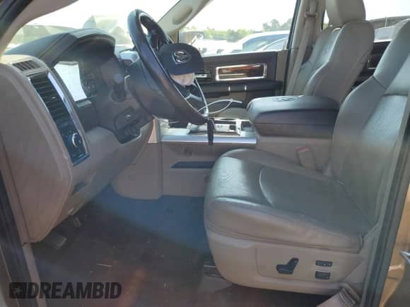 2012 Ram 1500 Laramie z VIN 1C6RD6NT9CS232971, wystawiony jako Copart lot #52209405 z przebiegiem 115 422 mil mil oraz Szkoda całkowita • Salvage title. Historia ofert i sprzedaży dostępna na DreamBid. Obrazek 7.