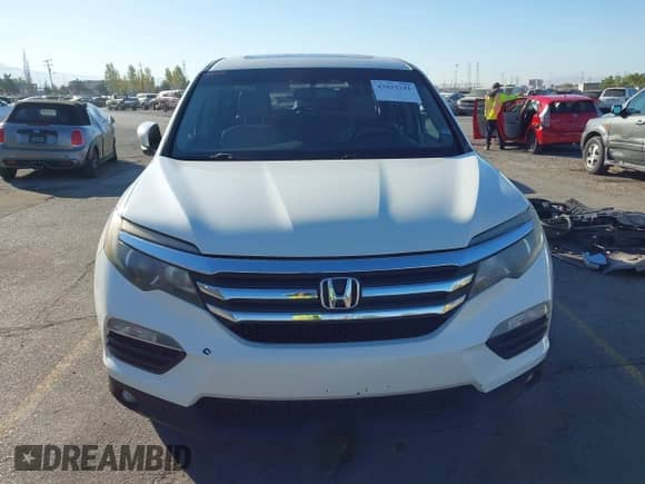 2018 Honda Pilot EX-L z VIN 5FNYF5H55JB026286, wystawiony jako IAAI lot #43023241 z przebiegiem 83 927 mil mil oraz . Historia ofert i sprzedaży dostępna na DreamBid. Obrazek 13.
