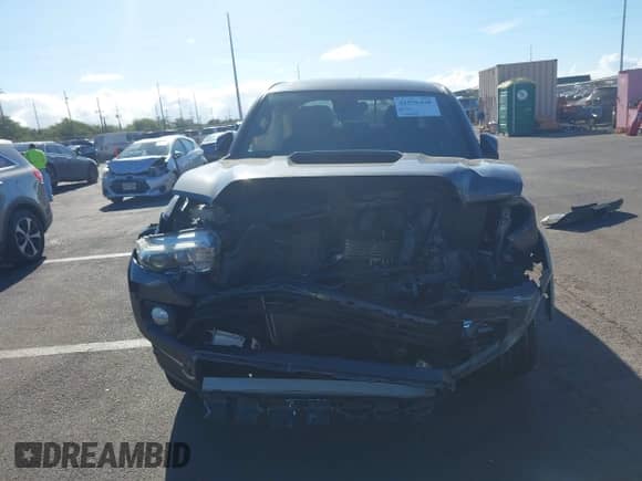 2020 Toyota Tacoma SR5 with VIN 3TMDZ5BNXLM084553, listed as a IAAI auction lot 42556448 with 74,634 mi miles and . Bid and sale history available at DreamBid. Image 13.