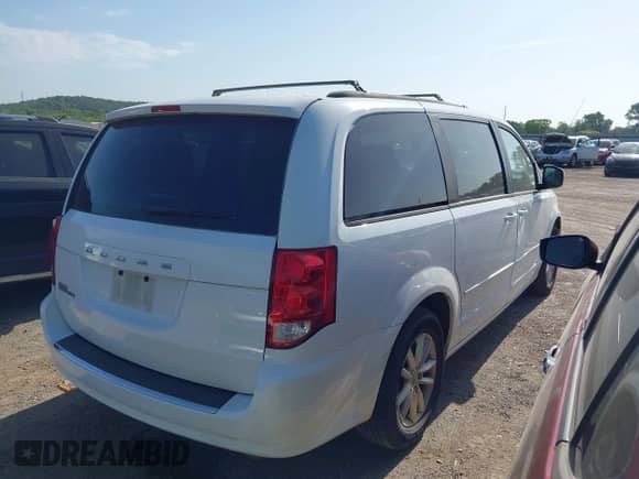 2014 Dodge Grand Caravan SXT z VIN 2C4RDGCG6ER477350, wystawiony jako IAAI lot #42711244 z przebiegiem 148 386 mil mil oraz . Historia ofert i sprzedaży dostępna na DreamBid. Obrazek 4.