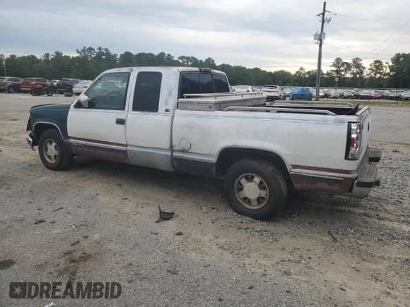 1994 GMC Sierra 1500 z VIN 2GTEC19K5R1587191, wystawiony jako Copart lot #70108465 z przebiegiem 215 236 mil mil oraz Szkoda całkowita • Salvage title. Historia ofert i sprzedaży dostępna na DreamBid. Obrazek 2.