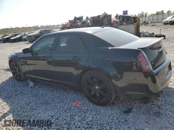 2014 Chrysler 300 SRT-8 with VIN 2C3CCAFJ3EH256845, listed as a Copart auction lot 77766654 with 86,962 mi miles and Salvage title. Bid and sale history available at DreamBid. Image 2.