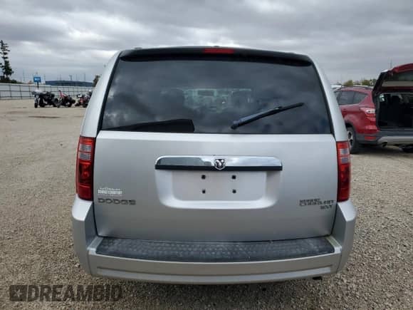 2010 Dodge Grand Caravan SXT with VIN 2D4RN5D10AR261437, listed as a Copart auction lot 87382835 with 96,558 mi miles and Clean title. Bid and sale history available at DreamBid. Image 6.