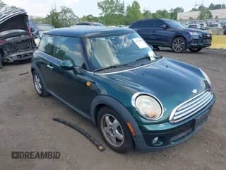2008 MINI Hardtop with VIN WMWMF33518TT67375, listed as a IAAI auction lot 42770049 with 104,403 mi miles and . Bid and sale history available at DreamBid. Image 1.