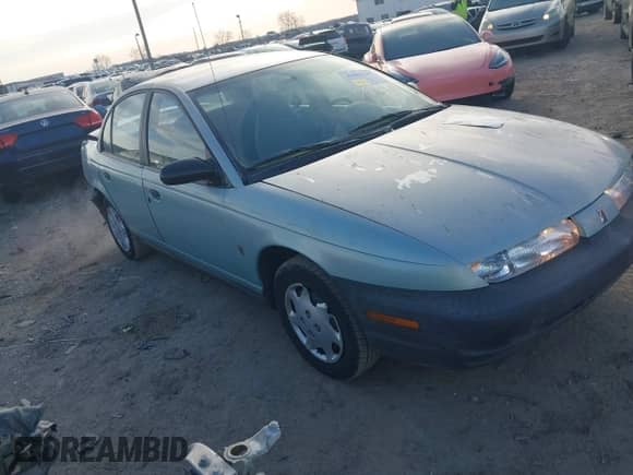 1997 Saturn SL with VIN 1G8ZH528XVZ196784, listed as a IAAI auction lot 41662187 with 112,278 mi miles and . Bid and sale history available at DreamBid. Image 1.