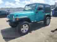 2002 Jeep Wrangler X z VIN 1J4FA39SX2P731469, wystawiony jako Copart lot #71106525 z przebiegiem 199 317 mil mil oraz Czysty tytuł • Clean title. Historia ofert i sprzedaży dostępna na DreamBid. Obrazek 1.