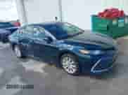 2021 Toyota Camry LE with VIN 4T1C11AK2MU534448, listed as a IAAI auction lot 43111658 with 89,877 mi miles and . Bid and sale history available at DreamBid. Image 1.