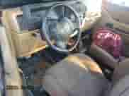 1997 Jeep Wrangler SE z VIN 1J4FY29PXVP437267, wystawiony jako Copart lot #69390955 z przebiegiem 151 349 mil mil oraz Czysty tytuł • Clean title. Historia ofert i sprzedaży dostępna na DreamBid. Obrazek 8.