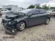 2015 Volvo S60 T5 Drive-E Premier with VIN YV140MFK4F1348785, listed as a Copart auction lot 80026105 with 74,217 mi miles and Salvage title. Bid and sale history available at DreamBid. Image 1.
