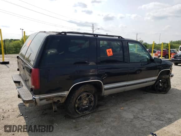 1997 Chevrolet Tahoe with VIN 1GNEK13R8VJ302550, listed as a Copart auction lot 60456735 with 253,393 mi miles and Clean title. Bid and sale history available at DreamBid. Image 3.