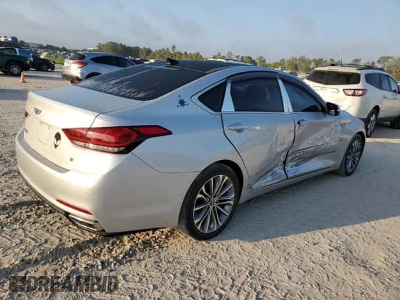 2015 Hyundai Genesis 3.8L z VIN KMHGN4JE5FU069927, wystawiony jako Copart lot #74990854 z przebiegiem 62 641 mil mil oraz Szkoda całkowita • Salvage title. Historia ofert i sprzedaży dostępna na DreamBid. Obrazek 3.