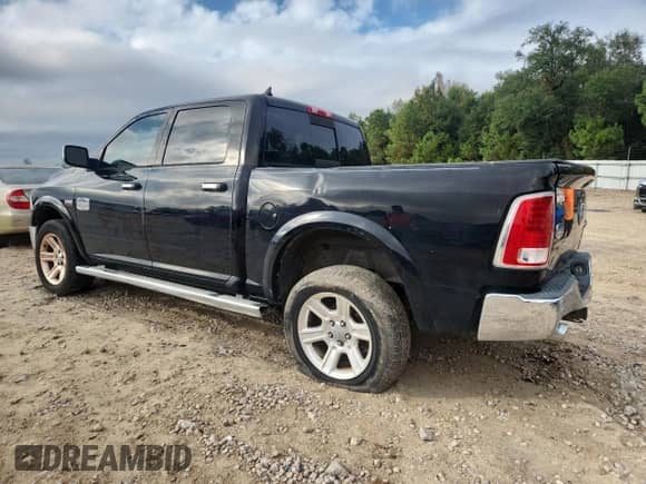 2015 Ram 1500 Laramie Longhorn with VIN 1C6RR7PT8FS539959, listed as a Copart auction lot 90313405 with 238,043 mi miles and Clean title. Bid and sale history available at DreamBid. Image 2.