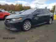 2019 Toyota Camry SE z VIN 4T1B11HK2KU234276, wystawiony jako Copart lot #89872425 z przebiegiem 105 753 mil mil oraz Czysty tytuł • Clean title. Historia ofert i sprzedaży dostępna na DreamBid. Obrazek 1.