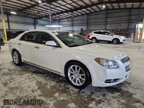 2012 Chevrolet Malibu LTZ 1LZ with VIN 1G1ZE5E09CF168390, listed as a Copart auction lot 84930215 with 154,381 mi miles and Salvage title. Bid and sale history available at DreamBid. Image 4.