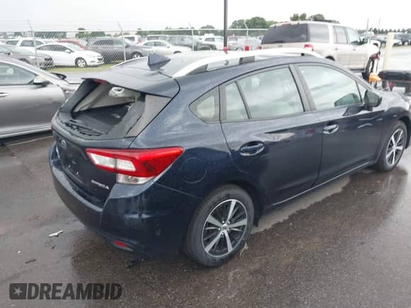 2019 Subaru Impreza Premium with VIN 4S3GTAD69K3706525, listed as a IAAI auction lot 42817665 with 96,172 mi miles and . Bid and sale history available at DreamBid. Image 4.