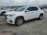 2018 Chevrolet Traverse High Country with VIN 1GNEVKKW2JJ157164, listed as a Copart auction lot 83887695 with 125,743 mi miles and Salvage title. Bid and sale history available at DreamBid. Image 1.