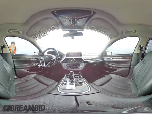 2017 BMW 7 Series 740i с VIN WBA7E2C52HG739390, выставлен на аукционе Copart как лот 81669495 с пробегом 124 451 миль миль и Списание • Salvage title. История ставок и продаж доступна на DreamBid. Изображение 14.