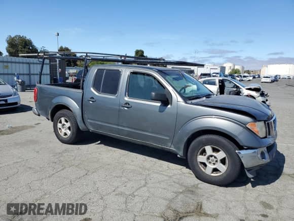 2006 Nissan Frontier SE with VIN 1N6AD07U36C427985, listed as a Copart auction lot 65688815 with 327,628 mi miles and Salvage title. Bid and sale history available at DreamBid. Image 4.
