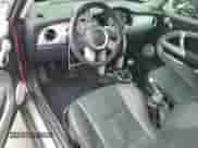 2006 MINI Hardtop with VIN WMWRC33526TK66647, listed as a Copart auction lot 81100025 with 179,203 mi miles and Salvage title. Bid and sale history available at DreamBid. Image 8.