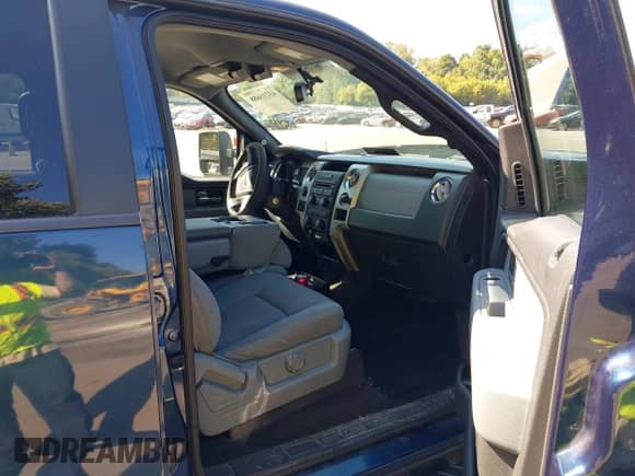 2014 Ford F-150 FX4 with VIN 1FTFW1ET8EFB87719, listed as a IAAI auction lot 43215688 with 165,880 mi miles and . Bid and sale history available at DreamBid. Image 5.