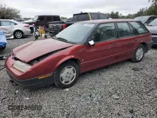 1995 Saturn SW with VIN 1G8ZH828XSZ334711, listed as a Copart auction lot 82365095 with 195,418 mi miles and Salvage title. Bid and sale history available at DreamBid. Image 1.