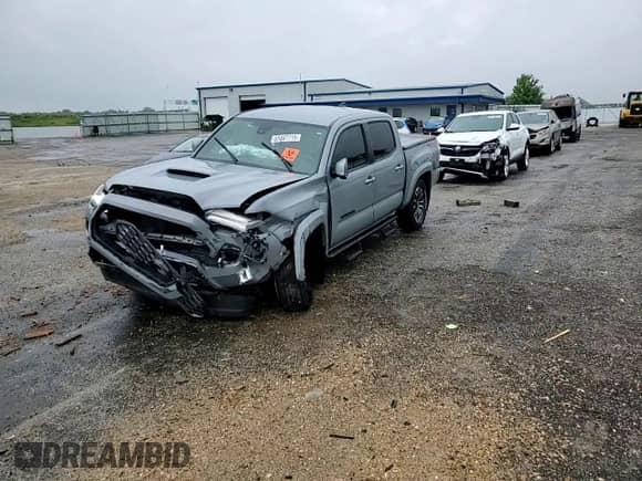 2020 Toyota Tacoma SR5 z VIN 3TMCZ5AN3LM365185, wystawiony jako Copart lot #65887715 z przebiegiem 123 533 mil mil oraz Szkoda całkowita • Salvage title. Historia ofert i sprzedaży dostępna na DreamBid. Obrazek 13.