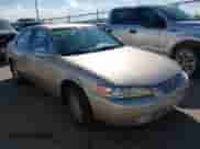 1999 Toyota Camry LE z VIN JT2BF28K7X0215290, wystawiony jako IAAI lot #43498604 z przebiegiem 166 636 mil mil oraz . Historia ofert i sprzedaży dostępna na DreamBid. Obrazek 1.